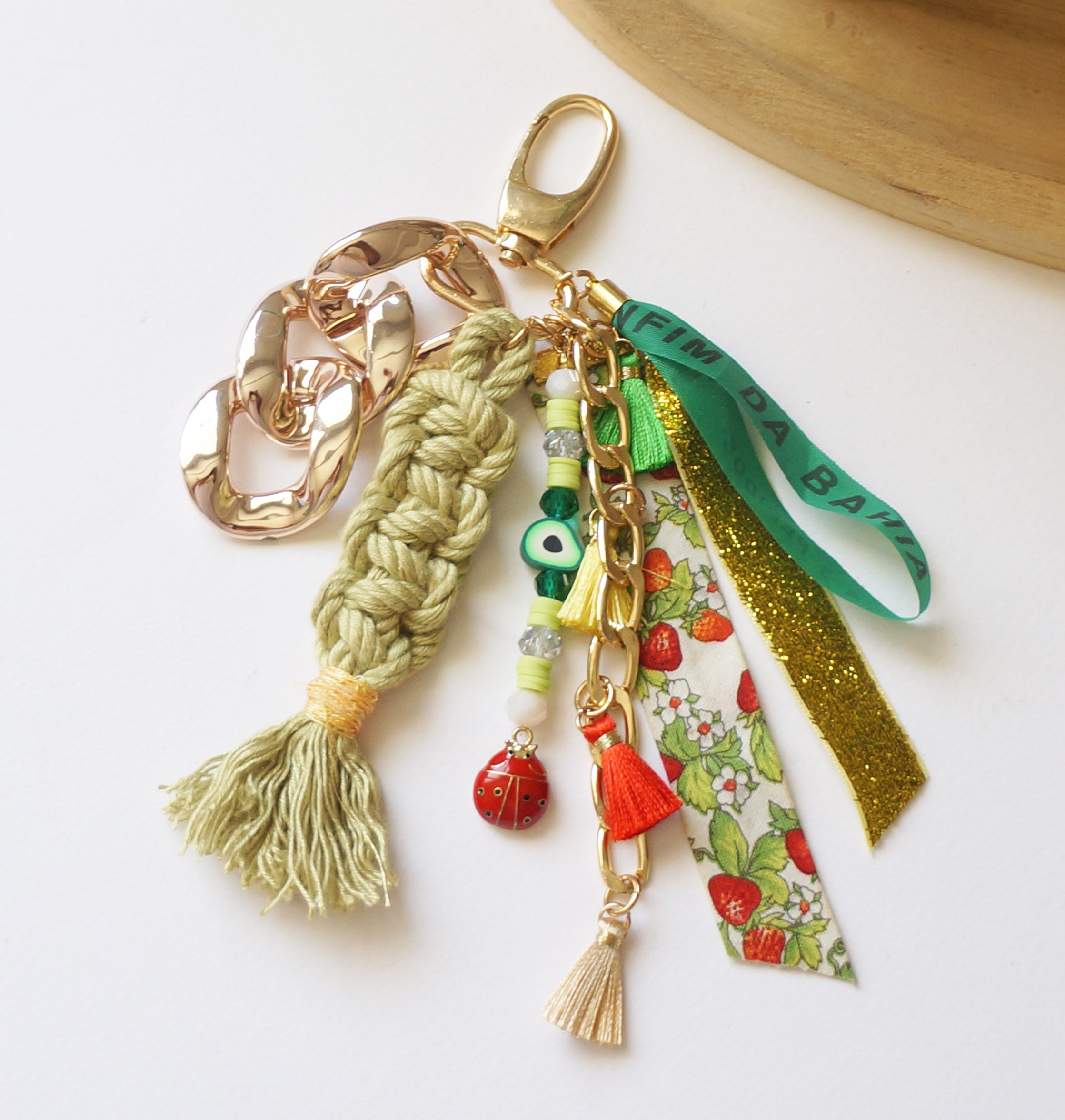 Green Boho Bag Charm – Lucky Bonfim Ribbon Keychain with Evil Eye Beads, Tassels & Ladybug Accent