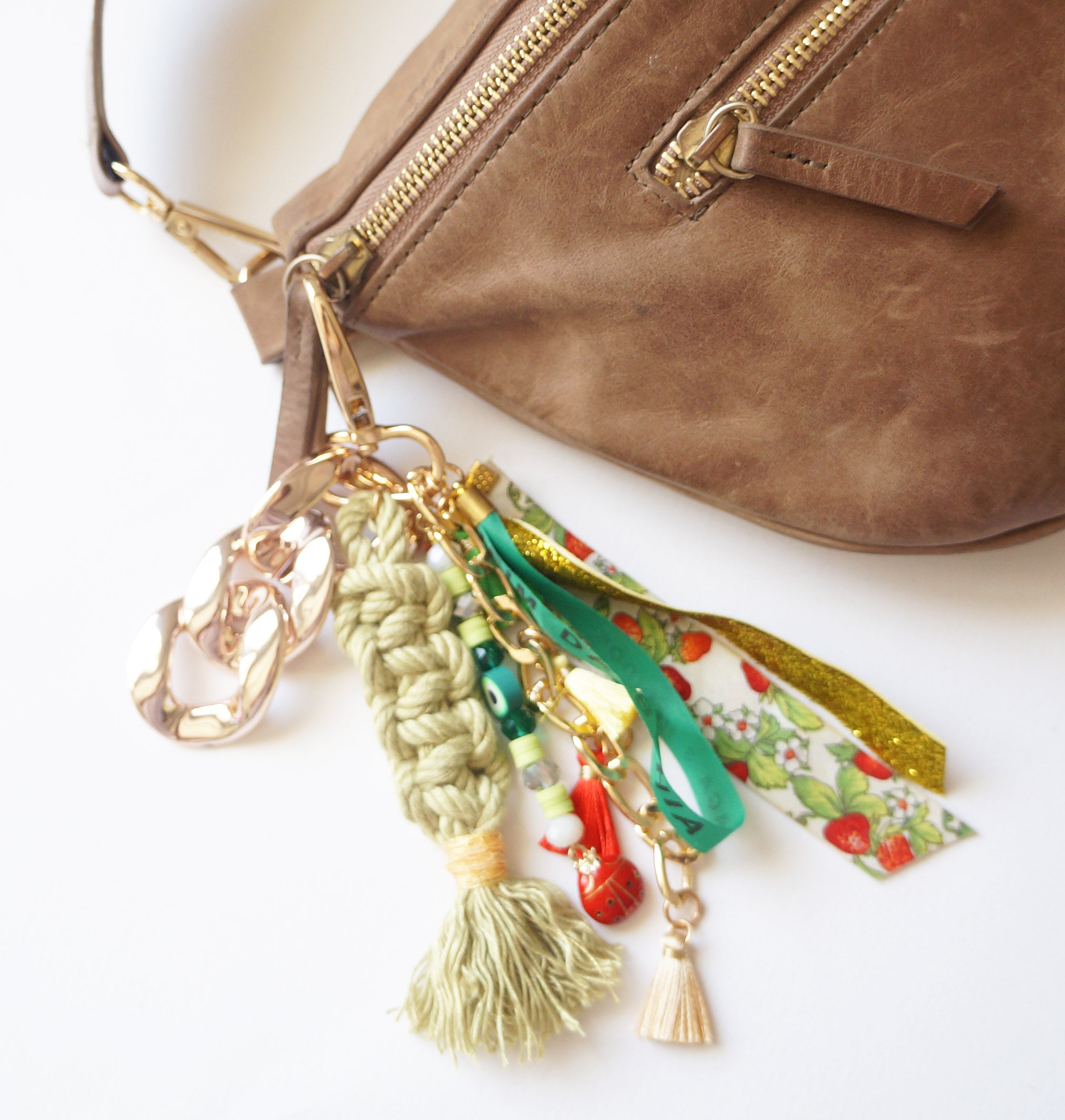 Green Boho Bag Charm – Lucky Bonfim Ribbon Keychain with Evil Eye Beads, Tassels & Ladybug Accent